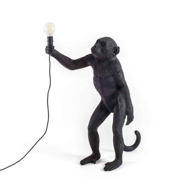 czarna lampa małpa stojąca